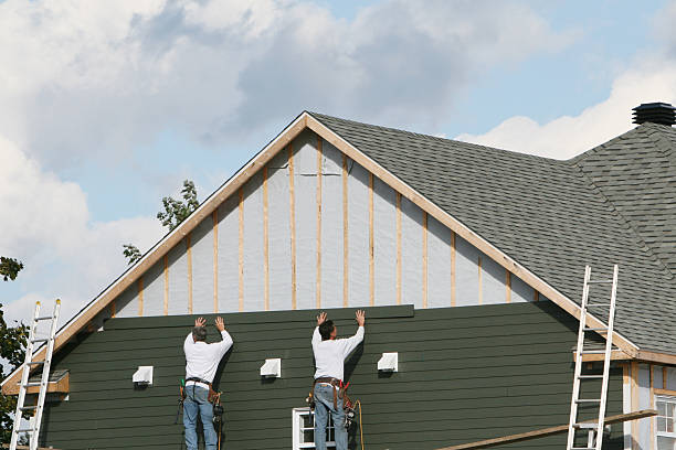 Professional Siding Replacement technician working in Petersburg, OH